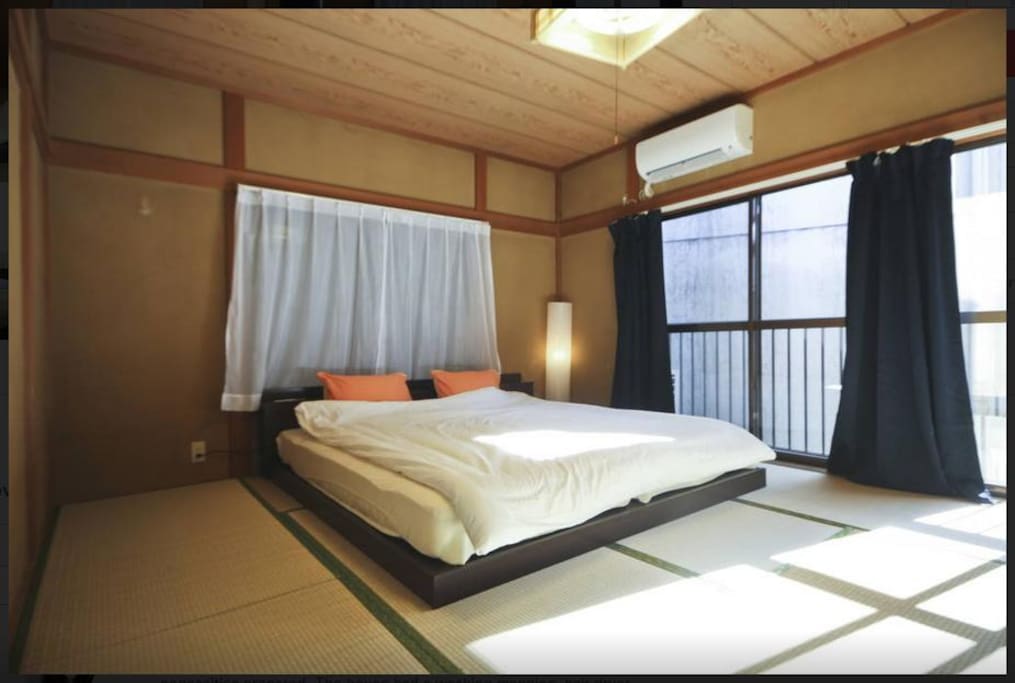 Japanese Tatami Room with 2 single beds that can be arranged into a king sized bed.