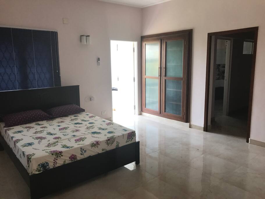 Master Bedroom with balcony & entrance to Dressing Room