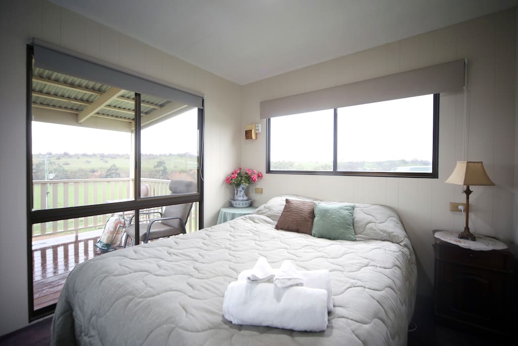 Main Cabin with Queen bed and views of the rolling hills