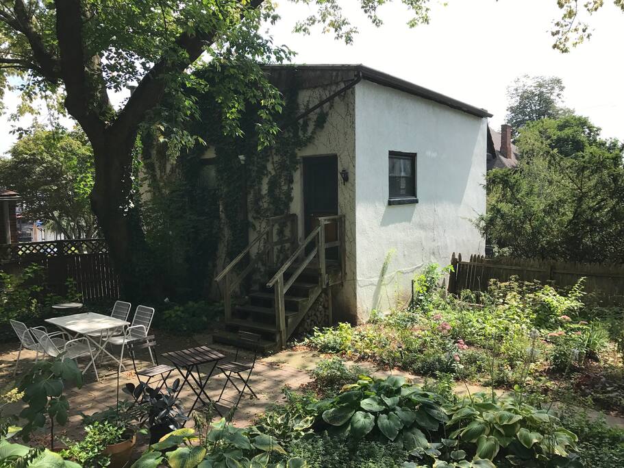 Private entrance from lush garden