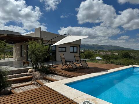 House with dike view with pool