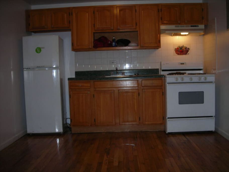 Utilities Included. Kitchen comes with coffee maker, pots, pans and utensils.