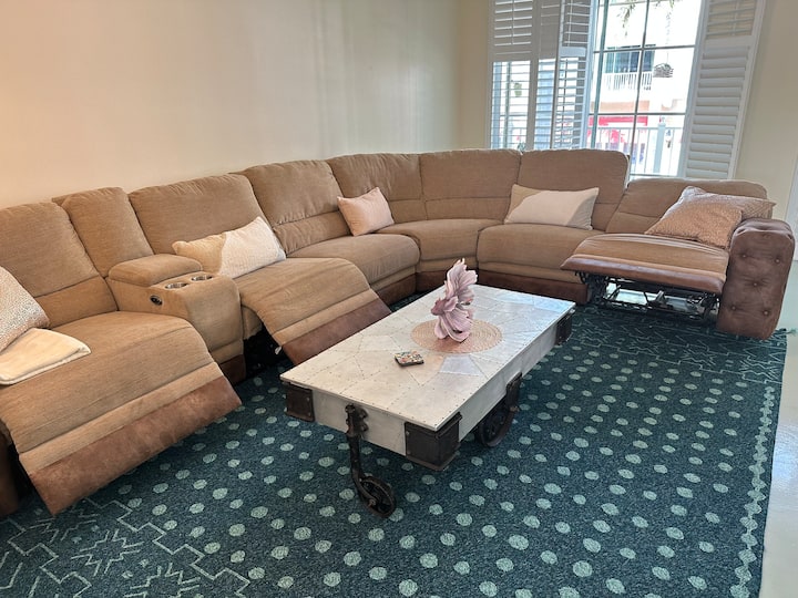 Enjoy a spacious living room with your family at this South Florida vacation home.