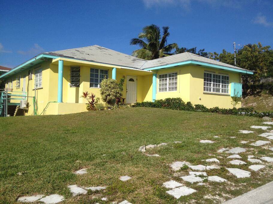 The house may look small from the outside but because it is a deep lot it goes back quite a ways. All the rooms are large inside and wide open.