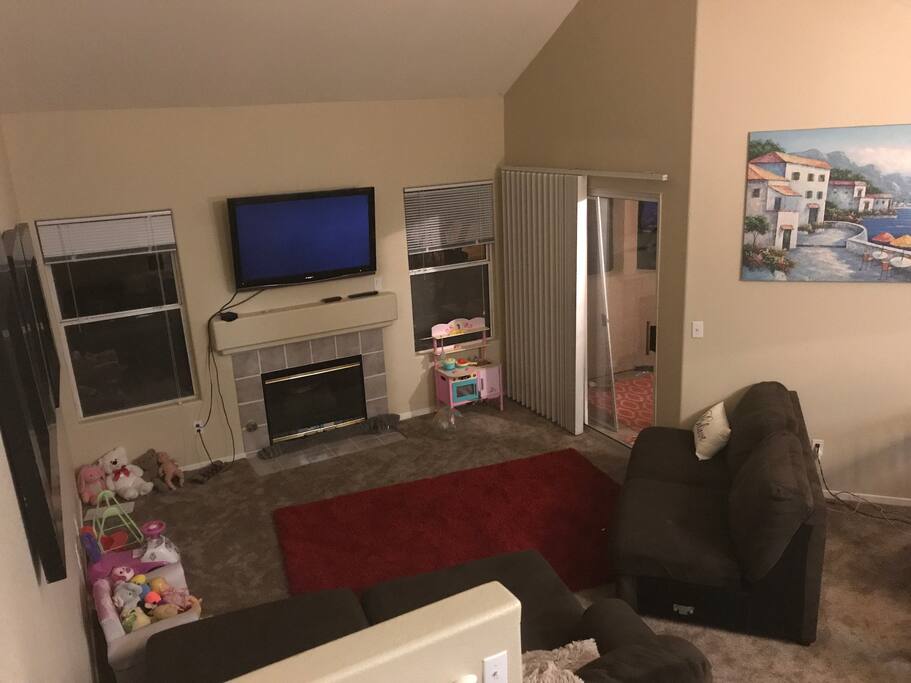 View of the living area from the loft stairs. Netflix, Apple TV, ABCGo, and more