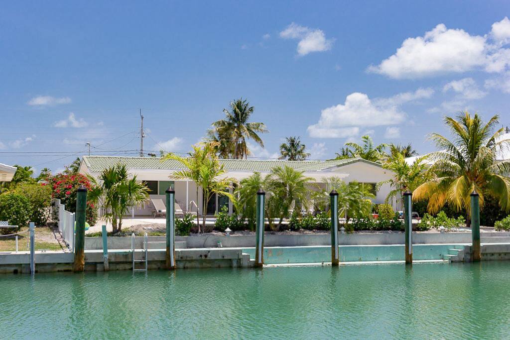 A view of your Key Colony Beach home from the canal. Professionally managed by TurnKey Vacation Rentals.