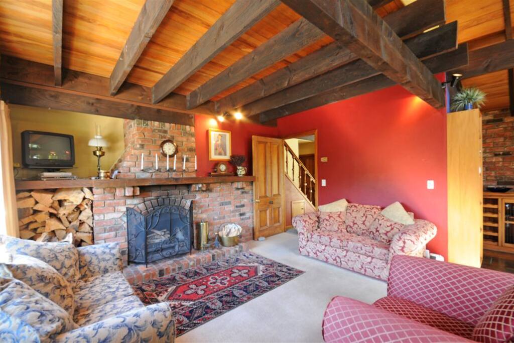 Cosy Living Room with Open Fire and Heat pump