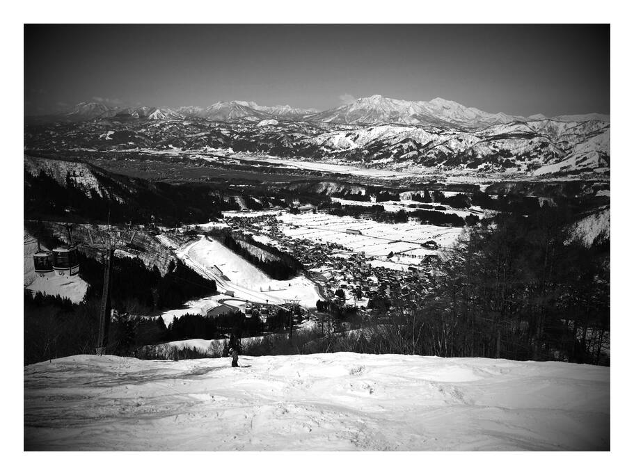 Village and Japan Northern Alps view from Utopia - spring skiing