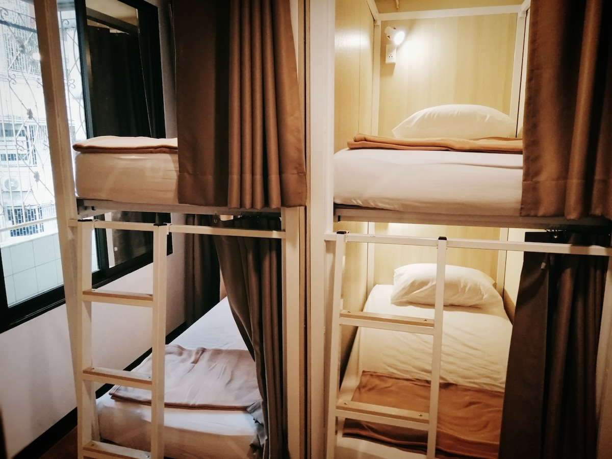 2 bunk beds in a room