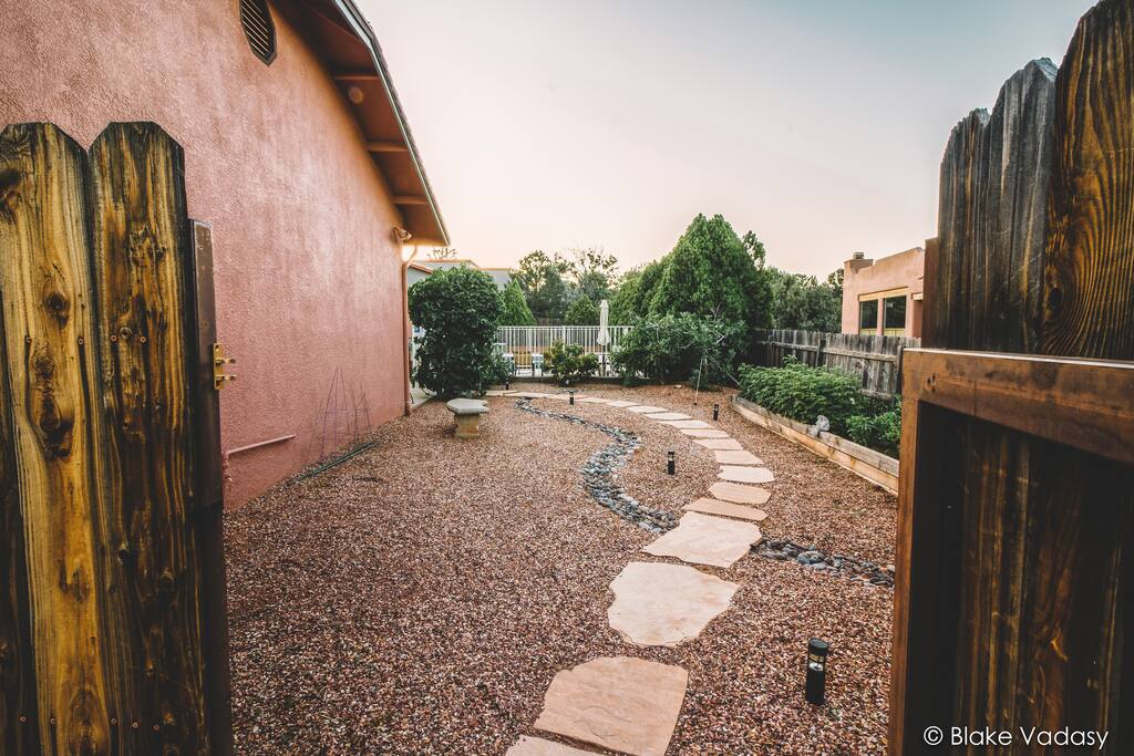 Your private entrance and path through garden. Enjoy fresh raspberries, figs and tomatoes when in season.