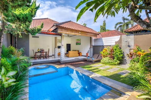 Lounge Poolside under Frangipani at an Airy Oasis