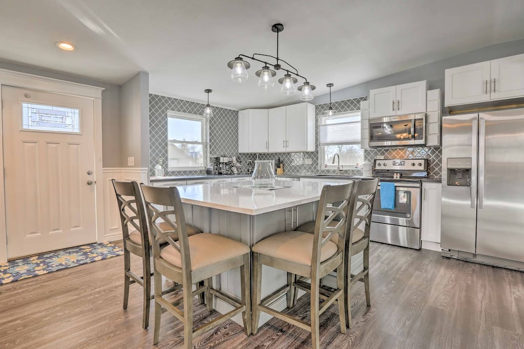Gather around the new granite island for a memorable family meal.