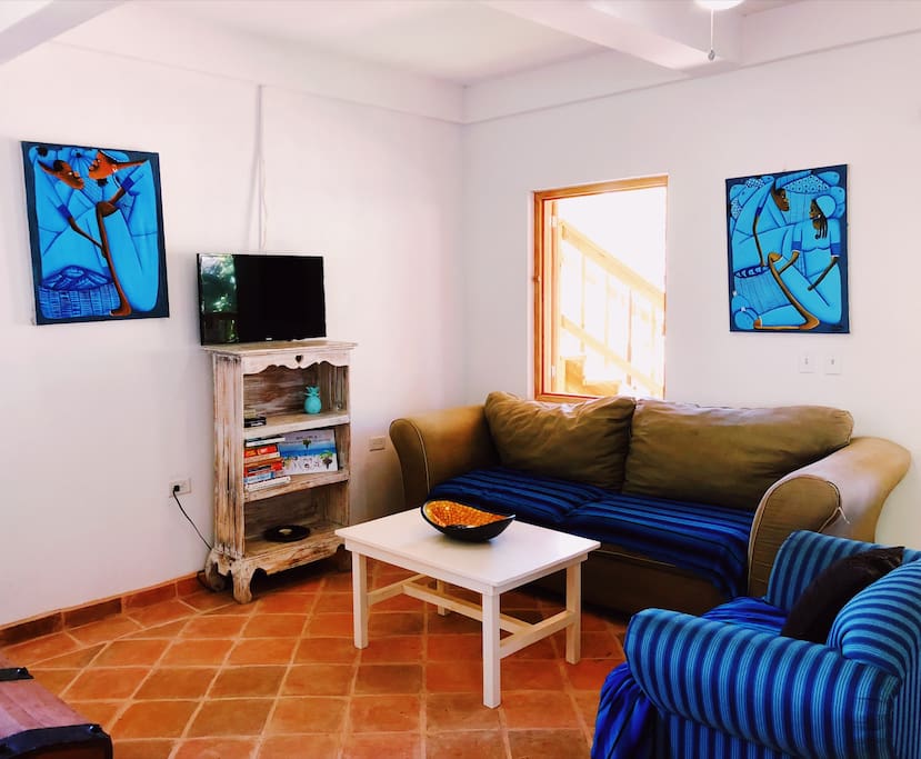 Living area, featuring local artwork