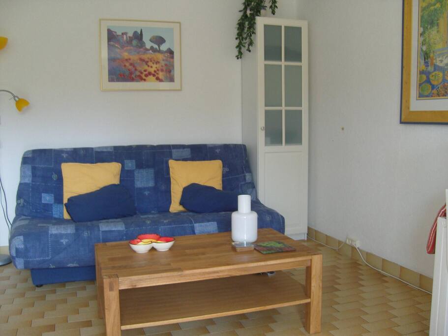 Woonkamer met bedbank