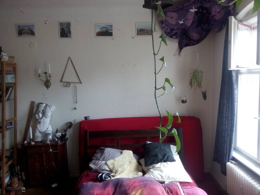 Bed. Behind the bed is a matrace for potential third person.