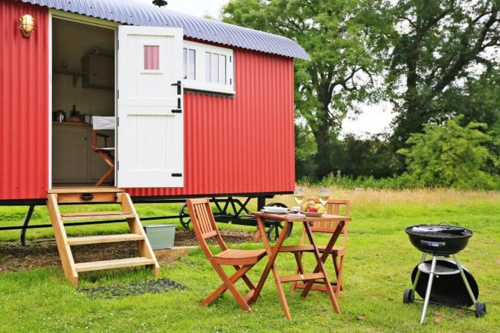 Exterior with seating and BBQ