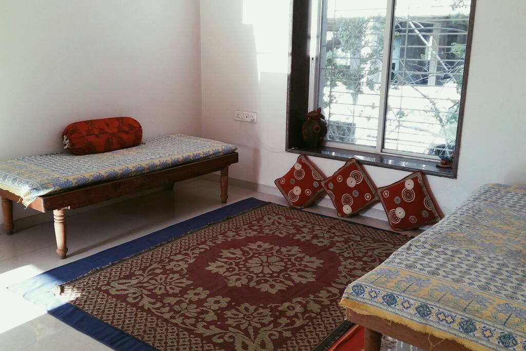 Living room with two single beds