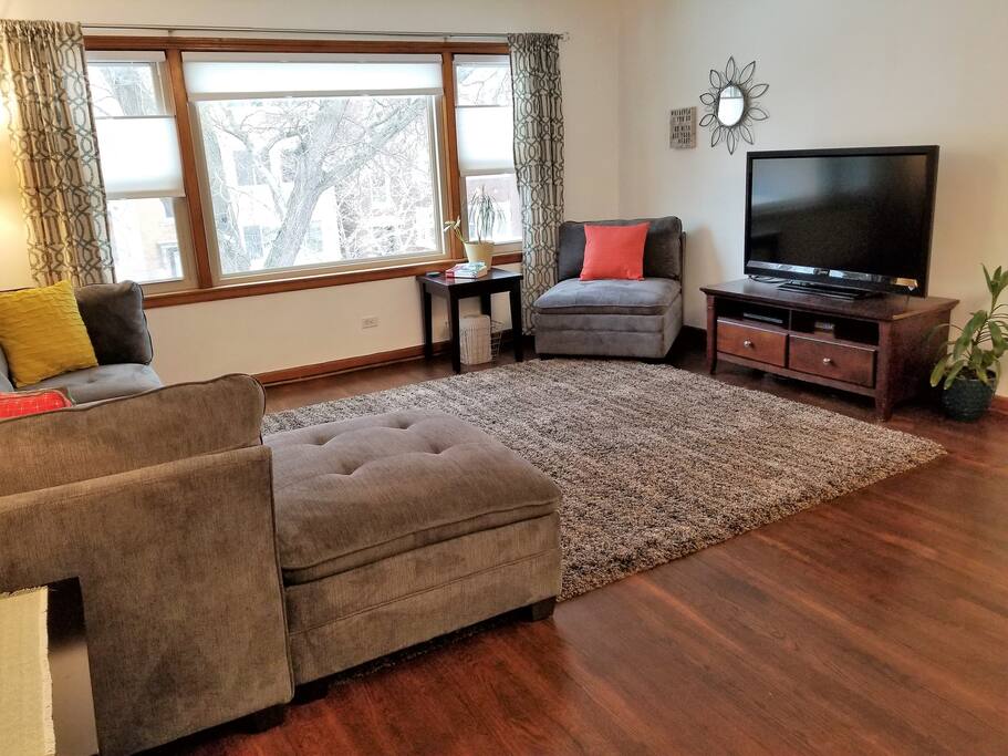 Living room with large picture window for lots of natural light