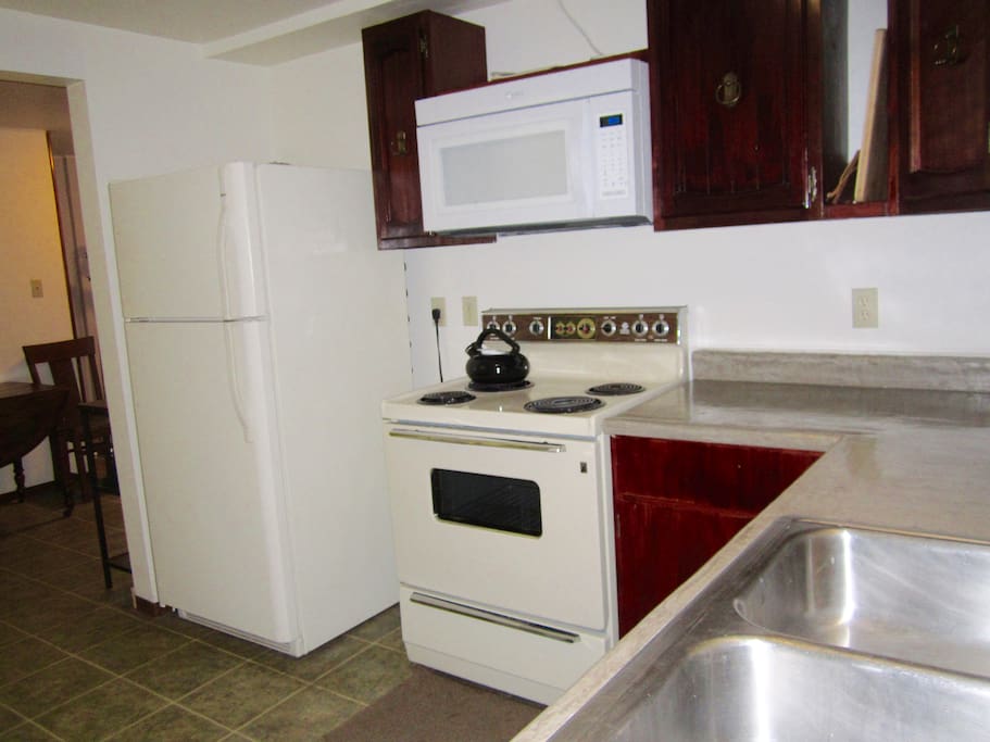 Fully stocked kitchen for her use.