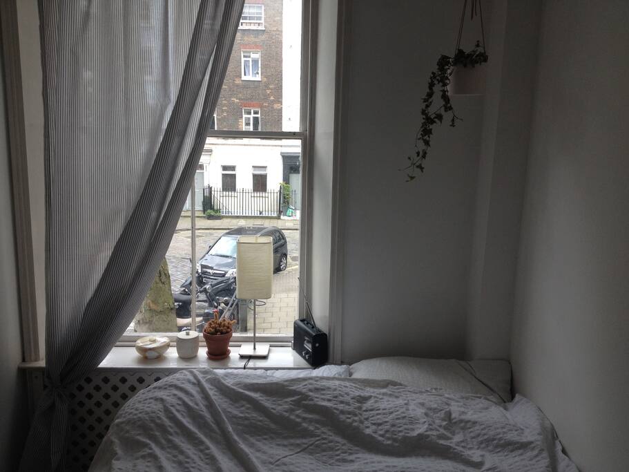 The bedroom faces a quiet Georgian street.