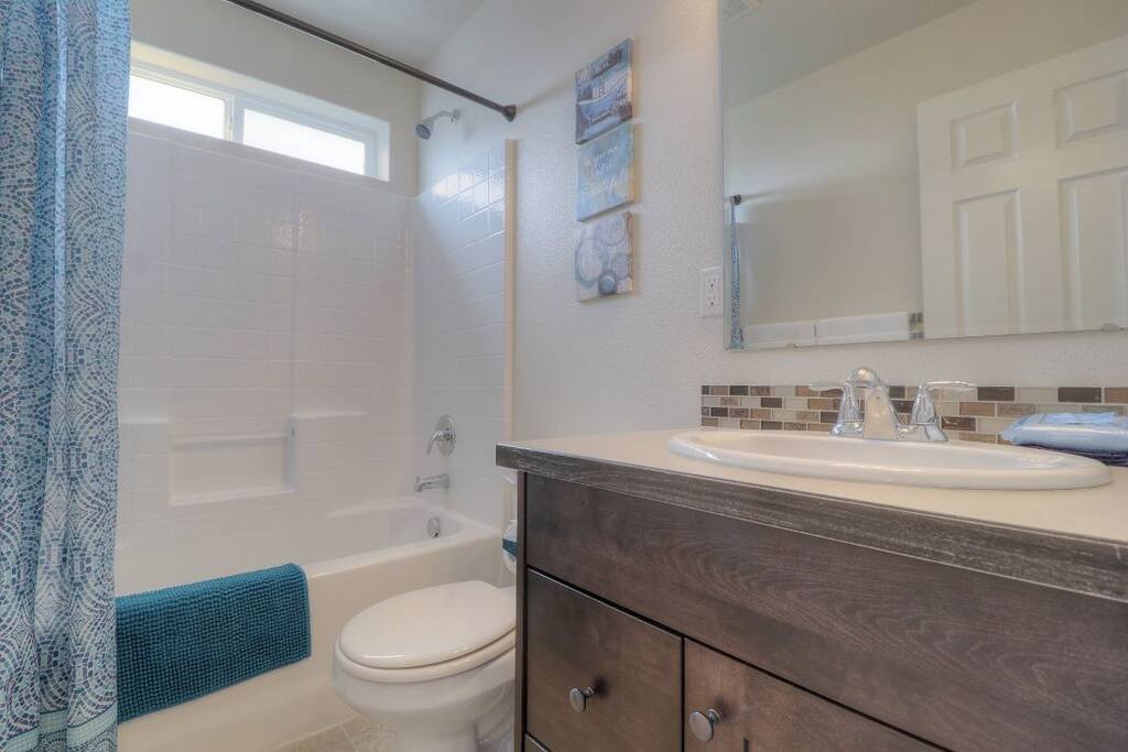 Upstairs shared bathroom next to the bedroom.