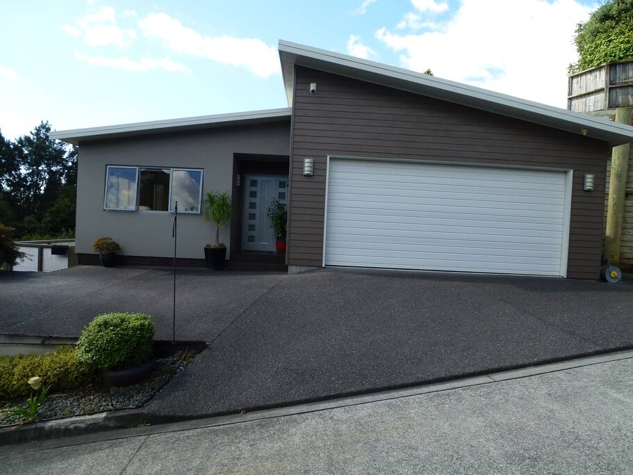 The front of our house & parking area for guests