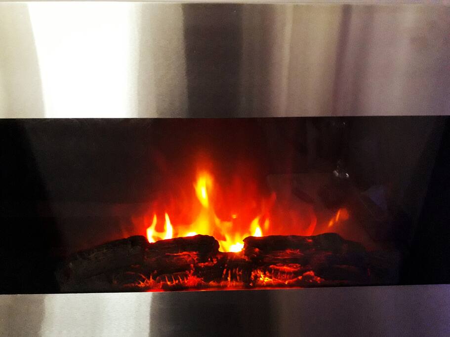 Stay cozy warm and enjoy the ambience of the fireplace
