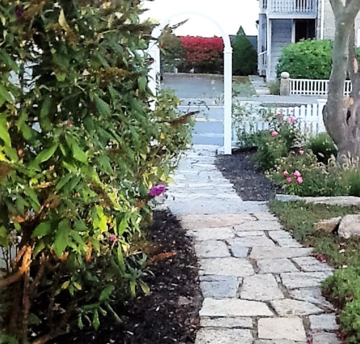 A cobblestone path welcomes you.