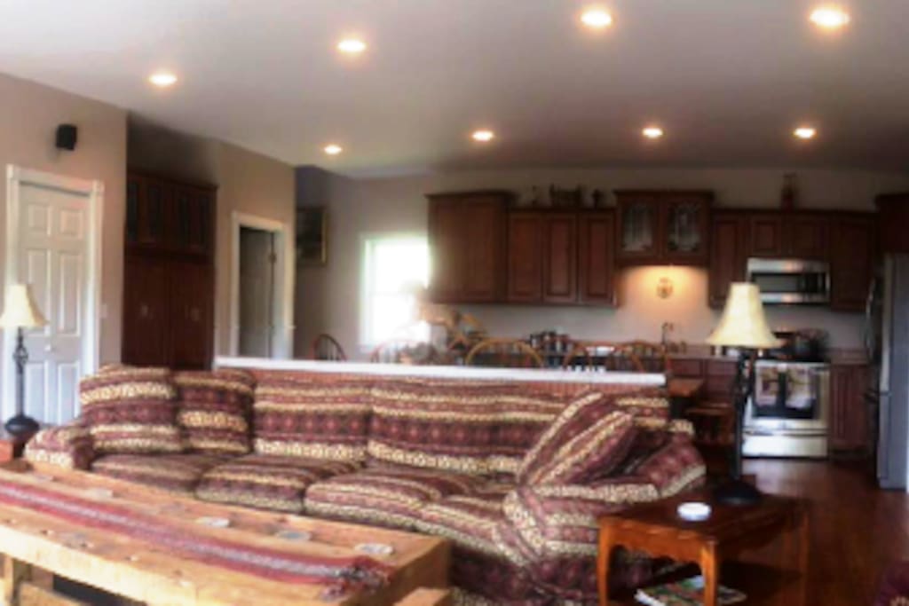 Great room with cable TV, stereo, wireless internet wood-burning stove and fully equipped kitchen.