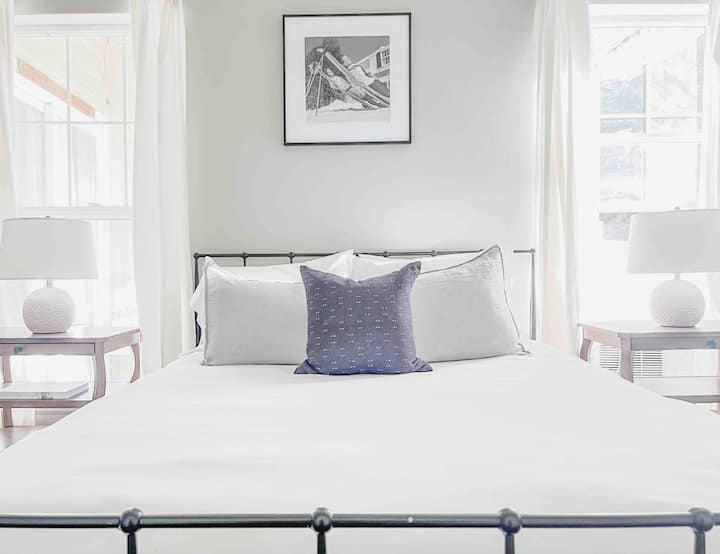 Serene queen bedroom with walk in closet and Mountain View’s of Utah Olympic Park. Window air conditioning 