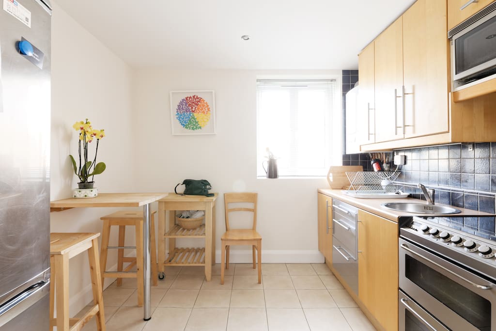 Freshly painted kitchen with every thing you need to cook a meal. Also a great breakfast bar.