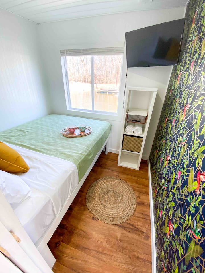 Bedroom 3 has a queen bed and a smart TV.