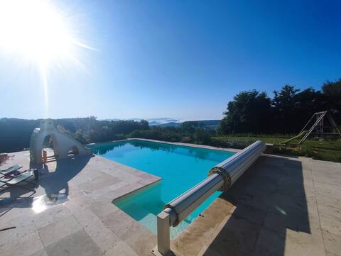 House with pool and volcanoes