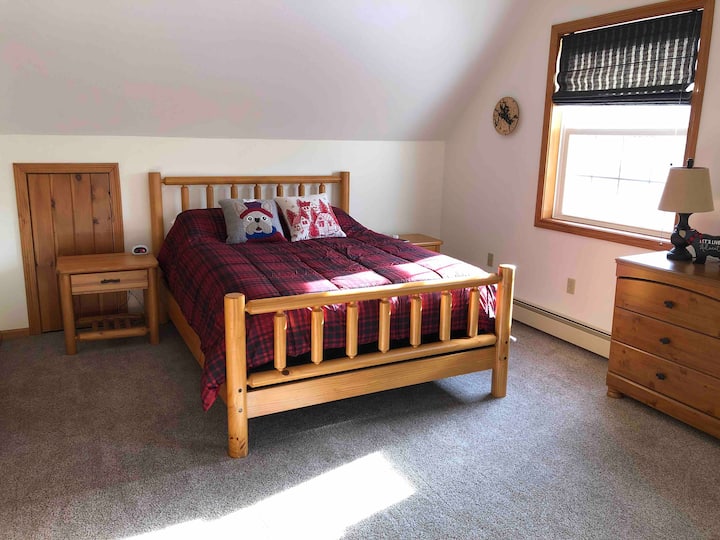 Master bedroom with sitting area and full bath