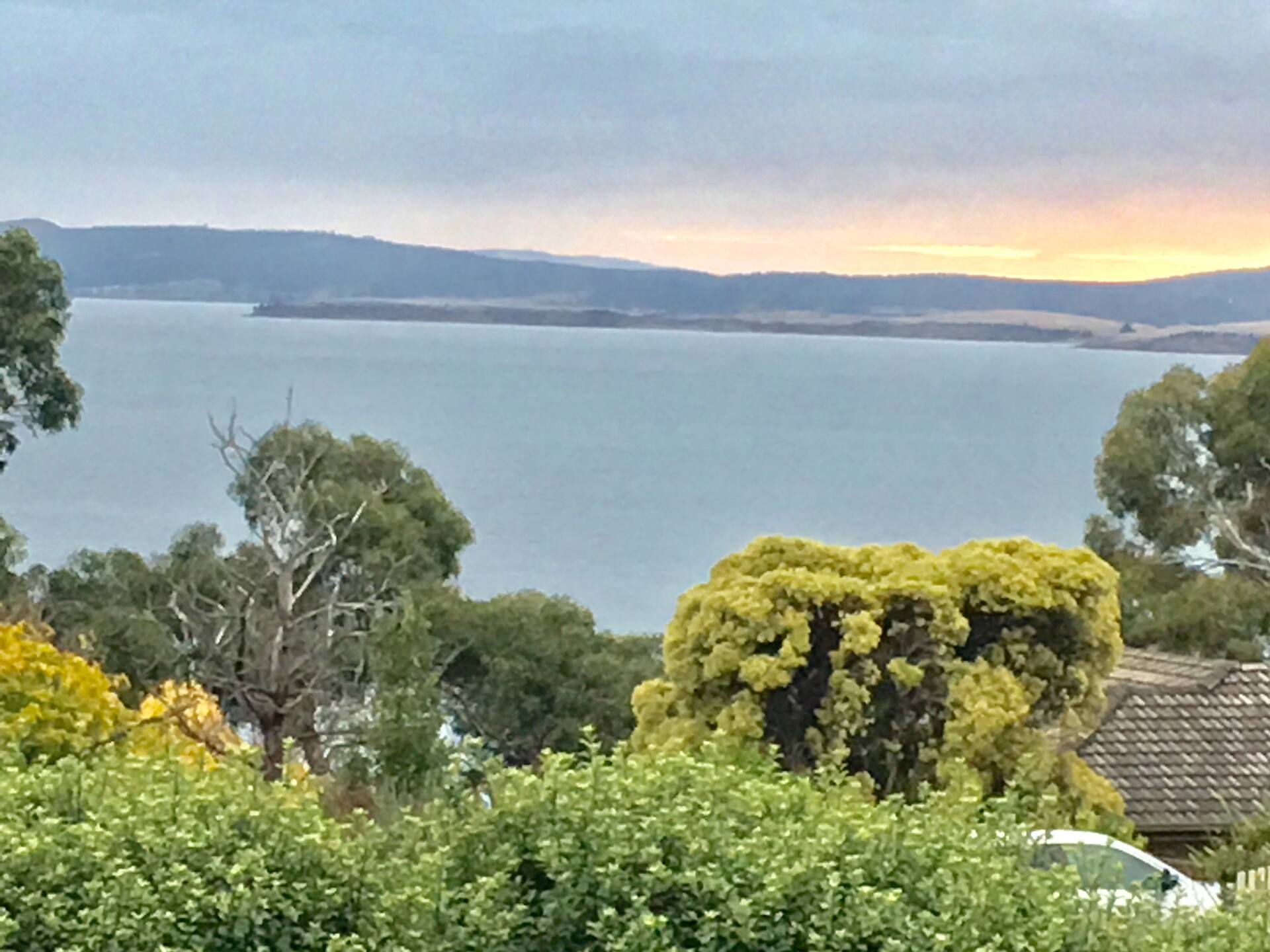 Hobart area, beach and mountain views.