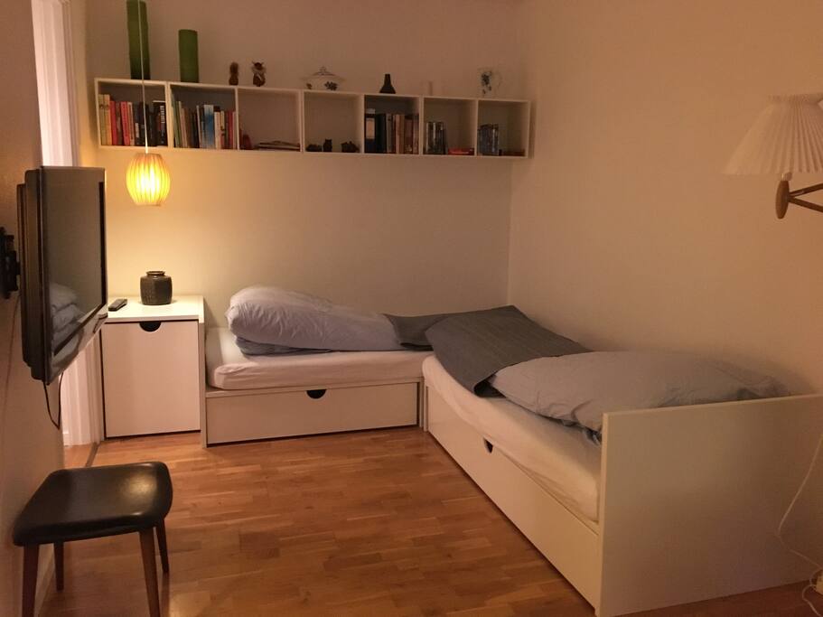 Two single beds with high-quality mattresses. The beds are fixed and can not be moved together.