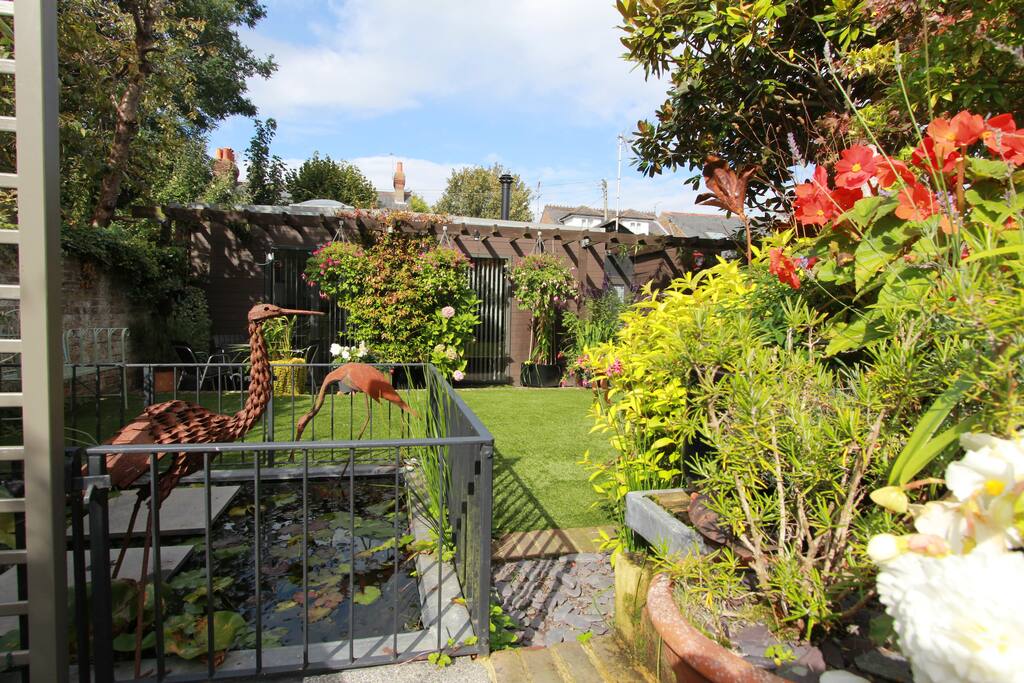 Shared garden with feature pond