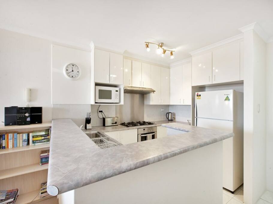 Modern kitchen also has internal laundry off the kitchen