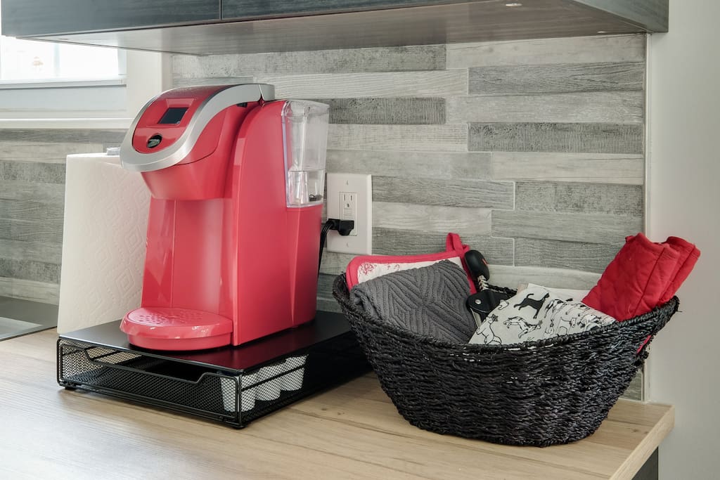 Keurig coffee maker and complimentary coffee and tea!