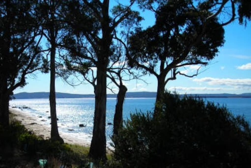 Beautiful Taroona Beach on the left of the cottage, in the early morning. Part of a lovely foreshore beach trail.