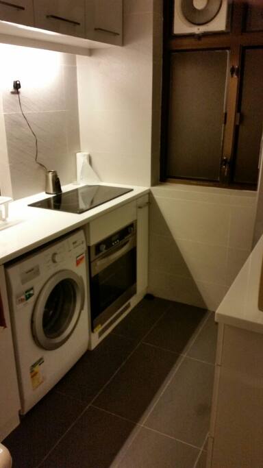 Kitchen & laundry. Full fridge, oven, cook top, microwave.