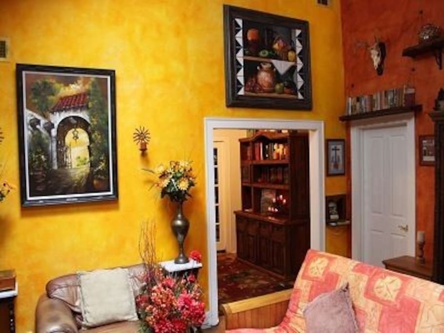 Living room has vaulted ceilings