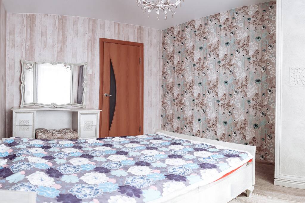 Quite bedroom with the big wardrobe for your luggage.