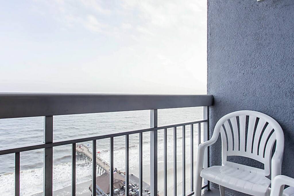 OUTDOOR BALCONY OVERLOOKING THE BEACH