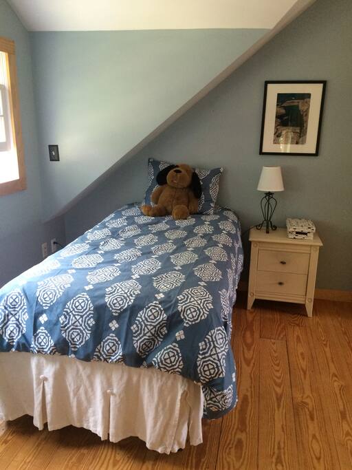 one of 3 twin beds, organic cotton sheets