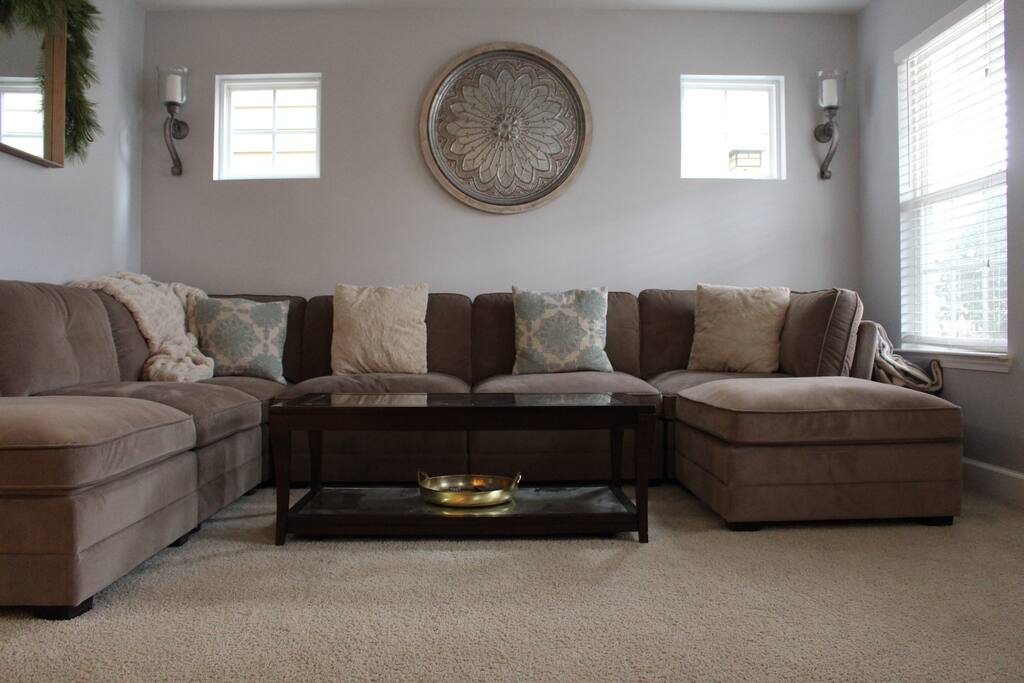 Cozy Living Room - moveable sectionals to turn into a bed!
