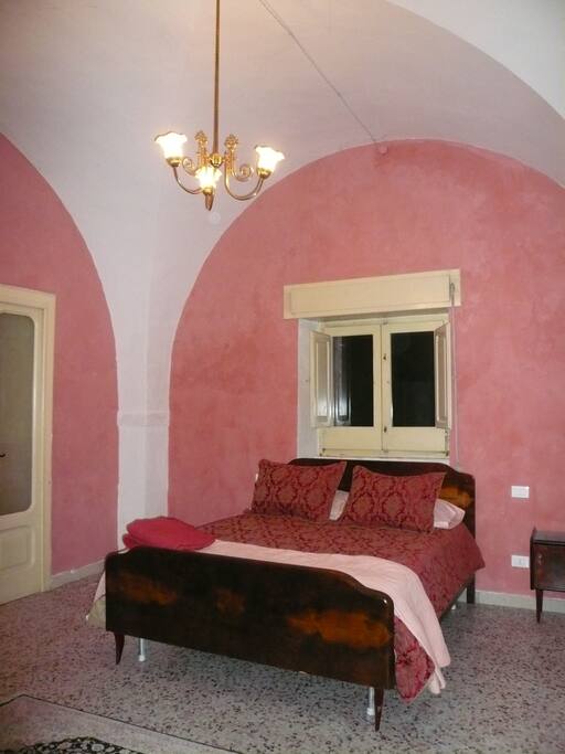 Red guest suite bedroom