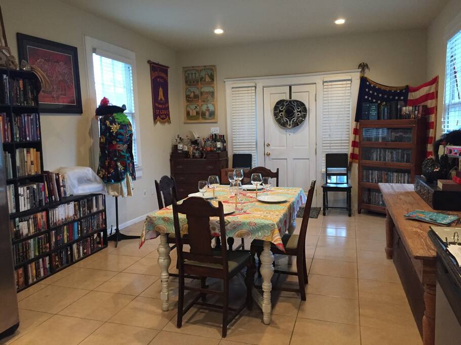 Enjoy a cocktail and a meal in the cheery dining room, surrounded by cookbooks and quirky antiques.
