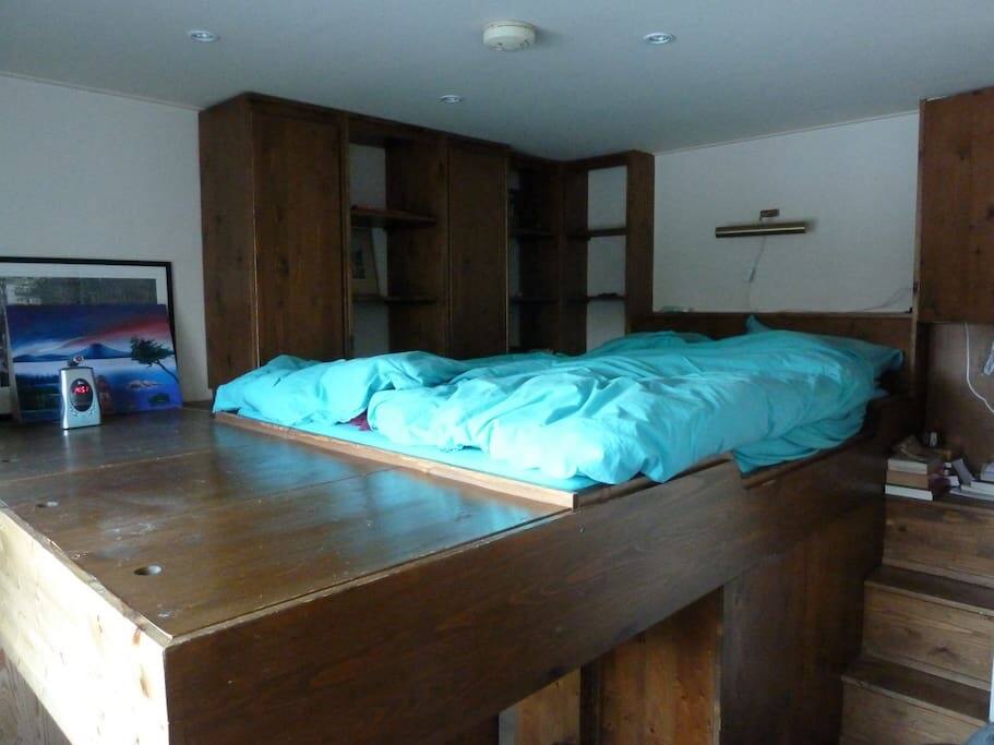 bed with view at the canal