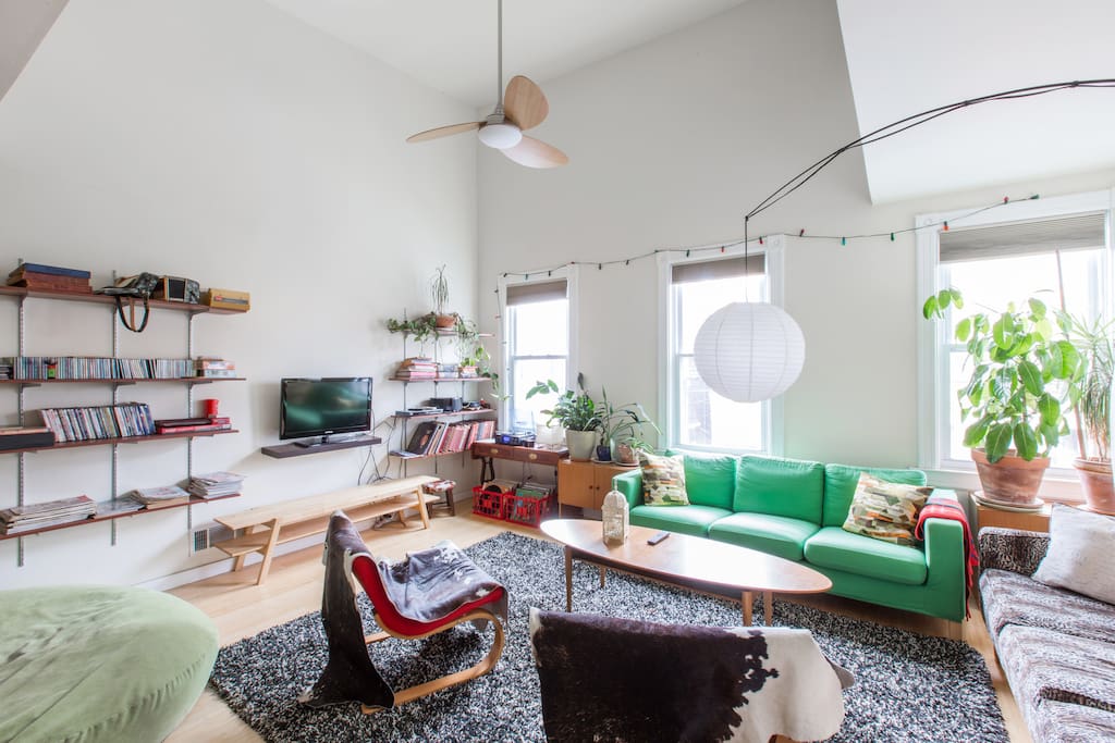 The big roomy sun filled living room is a great place to hang out & listen to the eclectic record collection